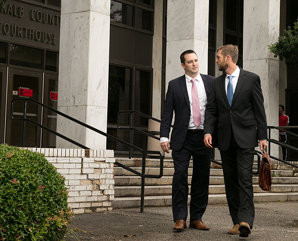 Joseph Henry and Troy Hendrick leave a Georgia Traffic Court